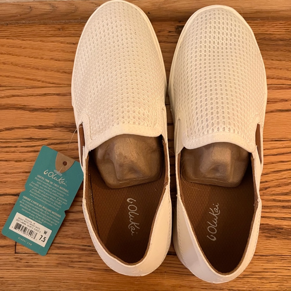 Olukai womens shoes. Size 7.5. Never worn! Still have tags and inserts. White.